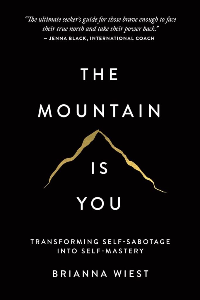 The Mountain Is You book cover by Brianna Wiest about overcoming self-sabotage and achieving self-mastery.
