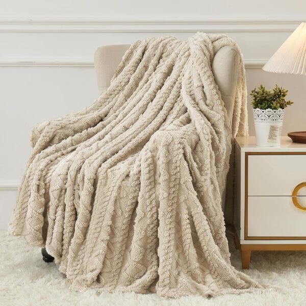 Diamond Fleece Blanket draped over a cozy armchair in a warm neutral living room