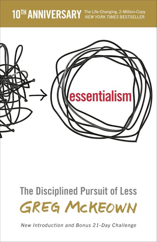Essentialism by Greg McKeown book cover in a minimalist CalmDone reading space.