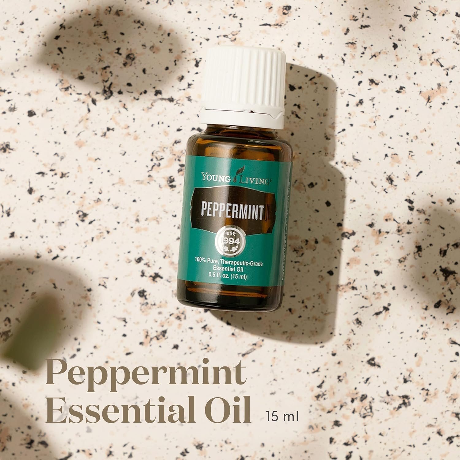 Young Living Peppermint Essential Oil 15 ml bottle for refreshing diffuser blends and aromatherapy