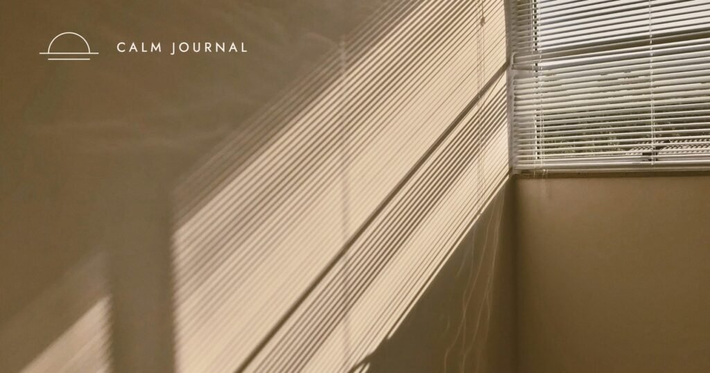 Soft sunlight and shadows on a beige wall, Calm Journal cover for the post on the Done List Method working