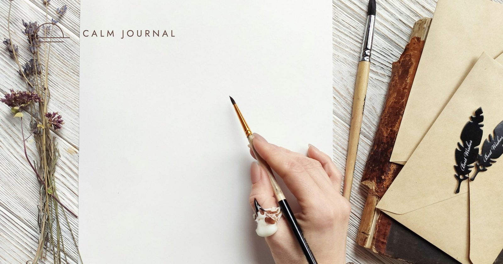 Hand writing on a blank white page, Calm Journal cover for the post on how to start writing blog posts